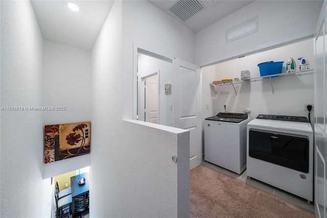 495 NE 5th Ln, Florida City, FL 33034 - laundry area featuring washer and clothes dryer and a textured wall