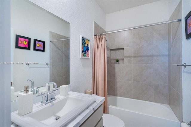 495 NE 5th Ln, Florida City, FL 33034 - full bathroom with vanity, shower / tub combo, toilet, and a textured wall