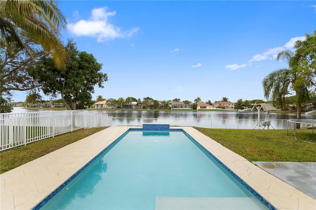 view of swimming pool with a fenced in pool, a water view, a lawn, and a fenced backyard