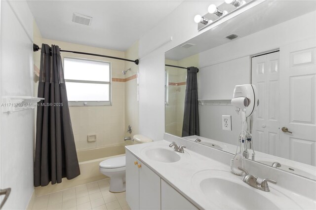 spare room featuring a textured ceiling, dark hardwood / wood-style flooring, and a healthy amount of sunlight