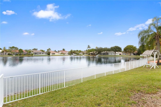 view of water feature featuring fence