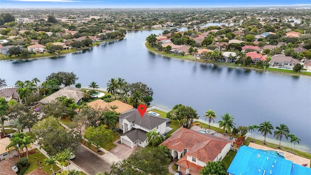 aerial view with a water view and a residential view