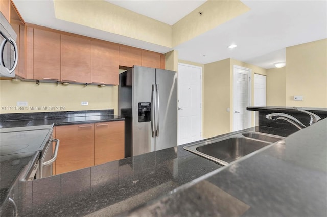 kitchen featuring sink and appliances with stainless steel finishes