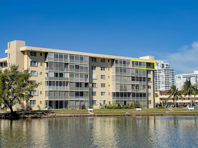 view of building exterior with a water view