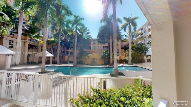 view of swimming pool with a patio