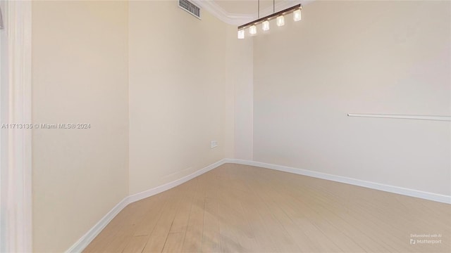 empty room featuring hardwood / wood-style floors