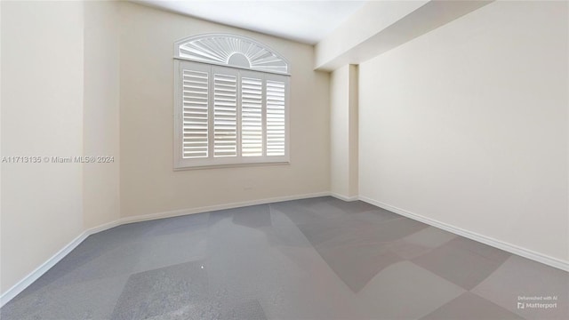 empty room with carpet flooring