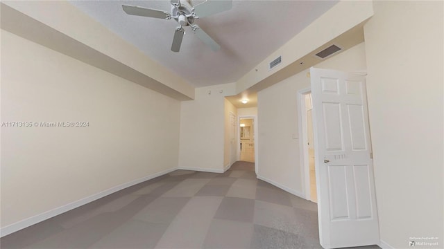 empty room with ceiling fan