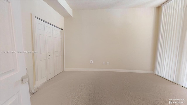 unfurnished bedroom featuring a closet