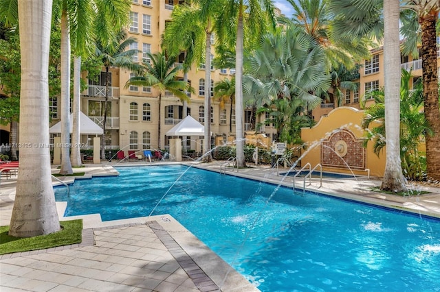 view of pool featuring pool water feature