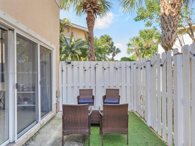 view of patio with fence