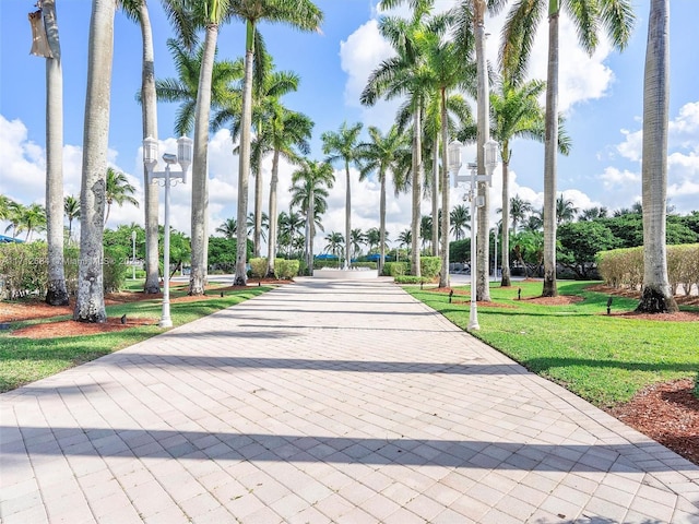 surrounding community with a yard