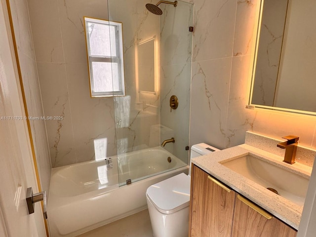 bathroom with shower / bathtub combination, vanity, and toilet