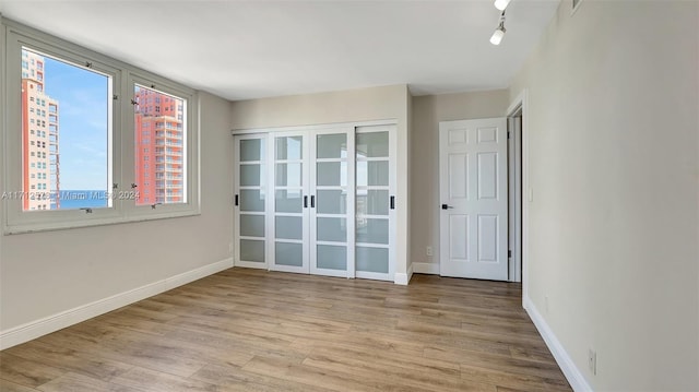 empty room featuring light wood-type flooring