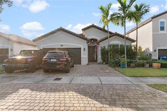 view of front of home featuring a garage