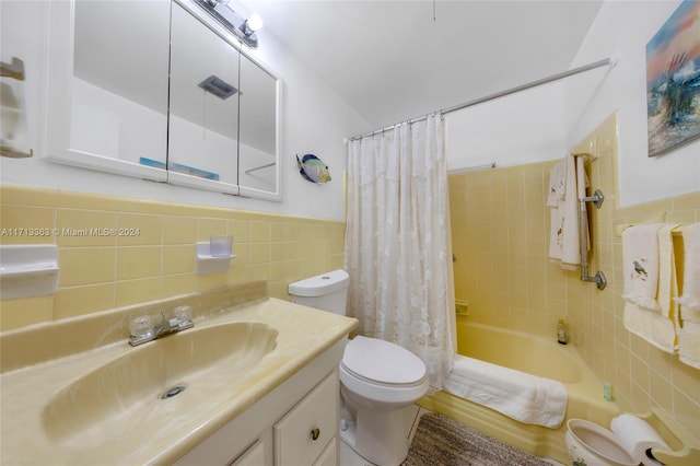 full bathroom with shower / bathtub combination with curtain, vanity, tile walls, and toilet