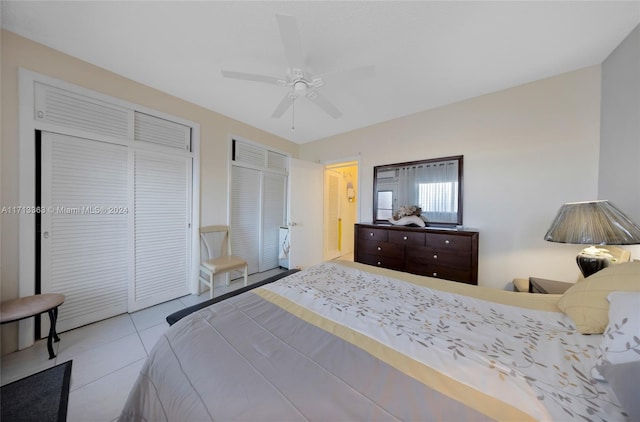 bedroom featuring ceiling fan and light tile patterned flooring