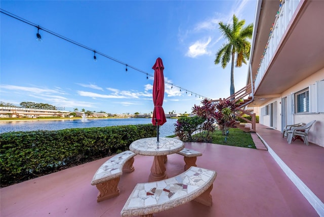 view of patio / terrace featuring a water view