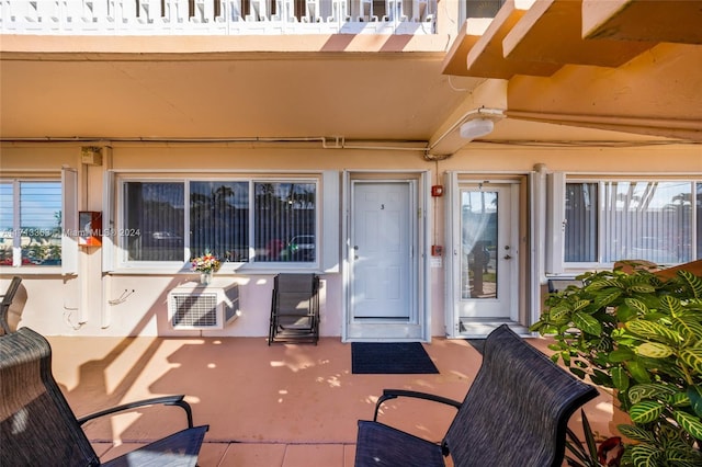 doorway to property featuring a patio