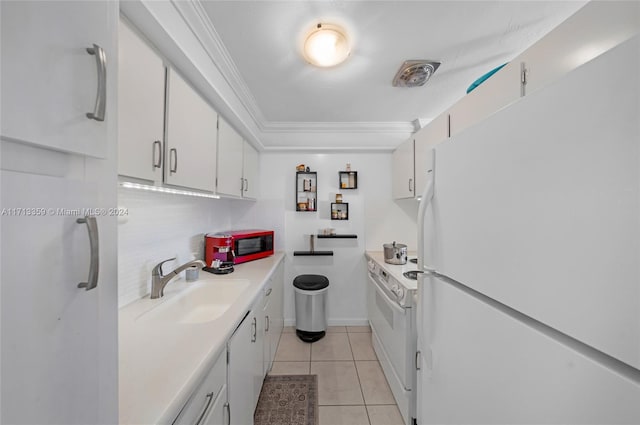 kitchen featuring white cabinetry, white appliances, sink, and tasteful backsplash