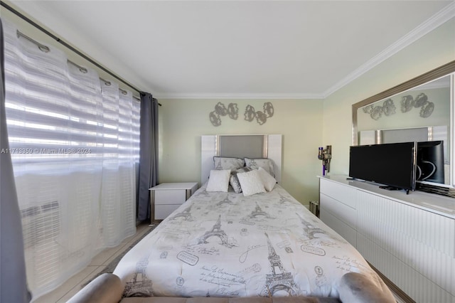 bedroom featuring crown molding