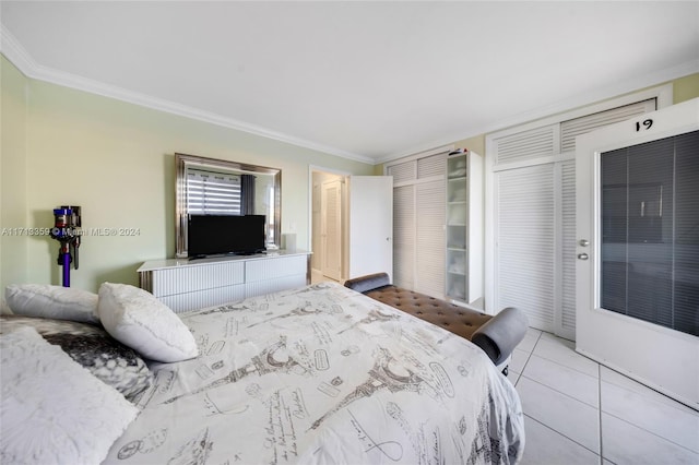 tiled bedroom featuring ornamental molding