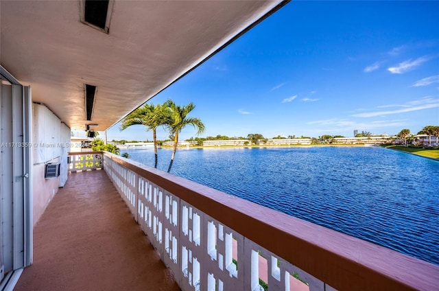 balcony featuring a water view