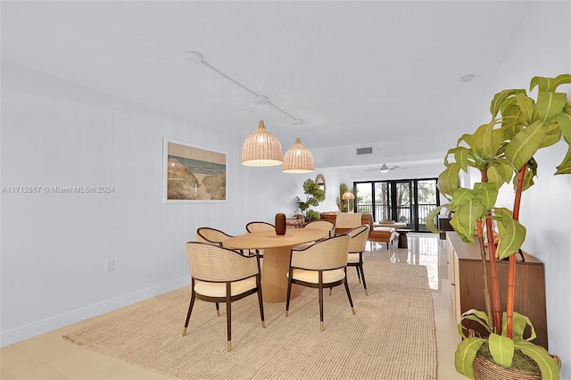 dining space with ceiling fan