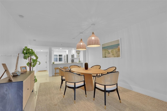 dining area featuring sink