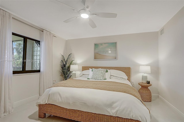 bedroom with ceiling fan and light colored carpet