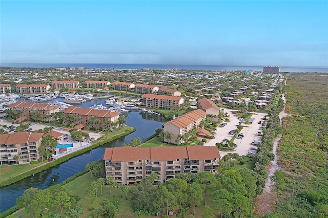 drone / aerial view with a water view