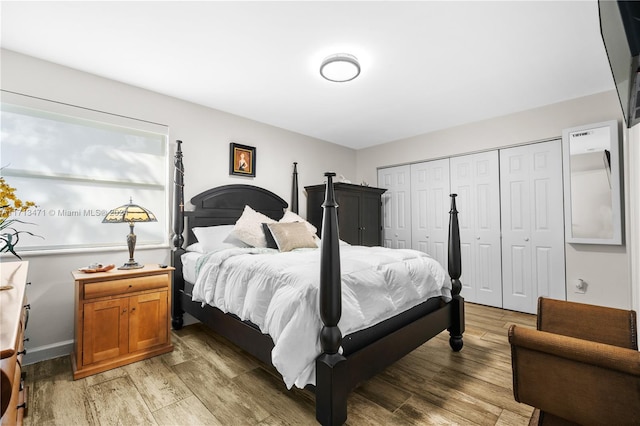 bedroom featuring hardwood / wood-style flooring