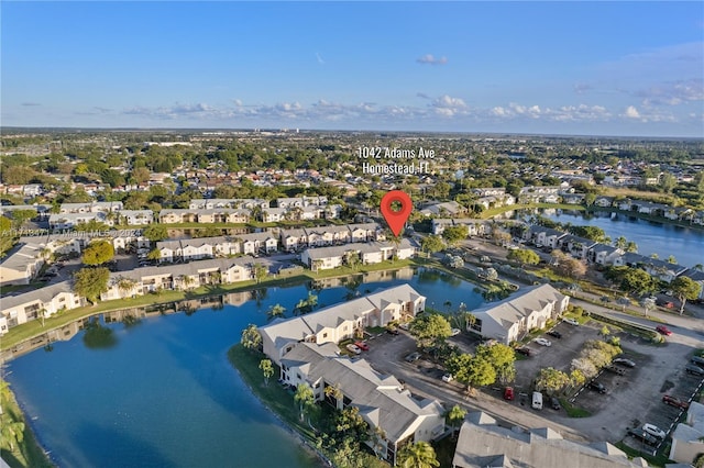 drone / aerial view with a water view