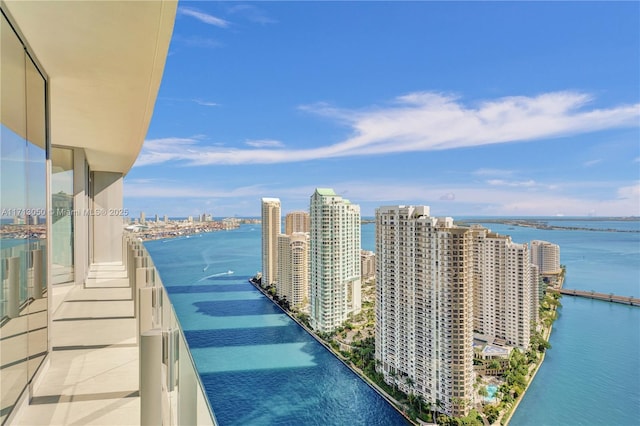 balcony featuring a water view