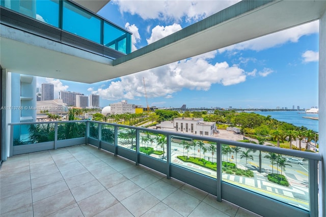 balcony featuring a water view