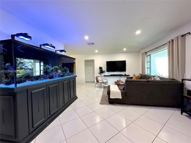 living room featuring light tile patterned floors