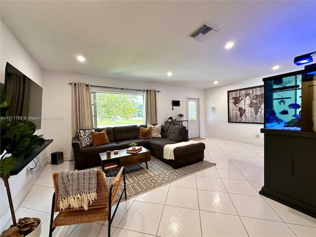 living room with light tile patterned floors