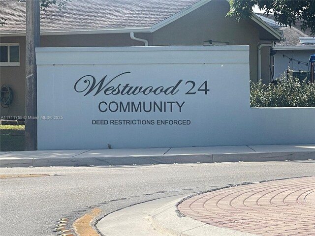 view of community / neighborhood sign