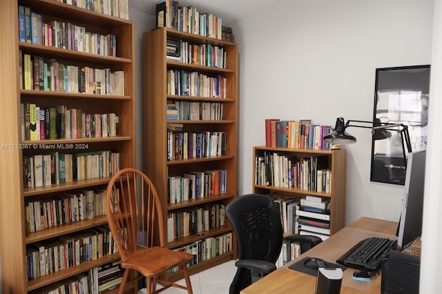 office area with light tile patterned floors