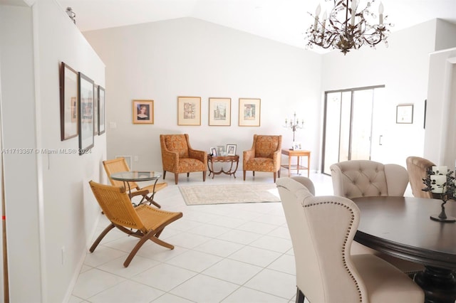 tiled living room with an inviting chandelier and vaulted ceiling