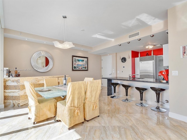 dining space with sink