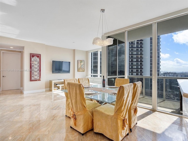 dining area with floor to ceiling windows