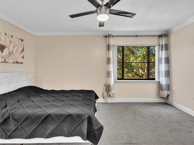 bedroom with ceiling fan, carpet floors, and ornamental molding