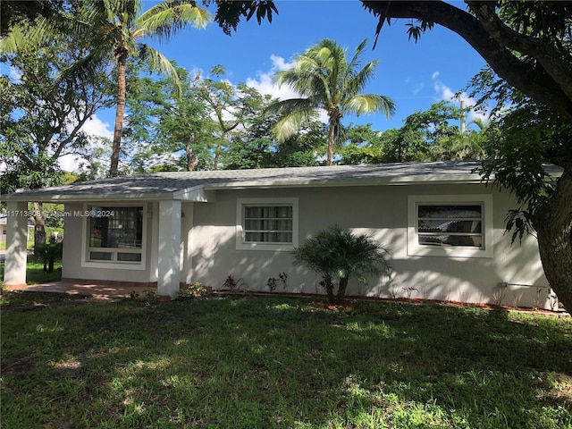 exterior space with a front yard