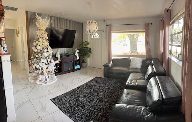 living room featuring an inviting chandelier