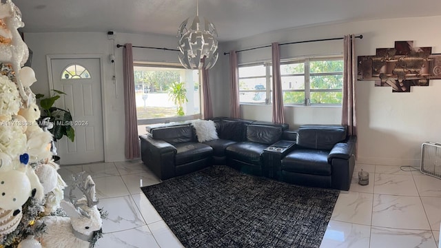 living room featuring a chandelier