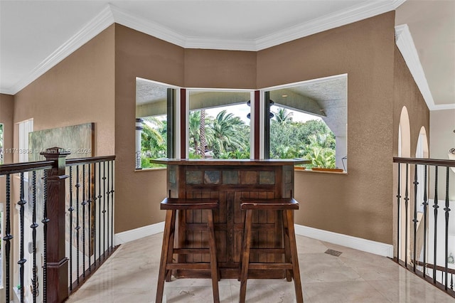 dining area with crown molding