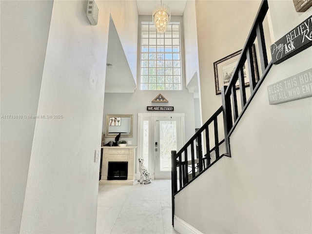 kitchen featuring appliances with stainless steel finishes, crown molding, backsplash, and light tile patterned floors