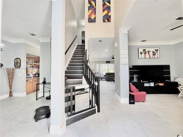 foyer with a notable chandelier and a towering ceiling