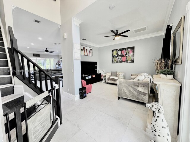 dining space featuring an inviting chandelier, ornamental molding, a textured ceiling, and light tile patterned floors